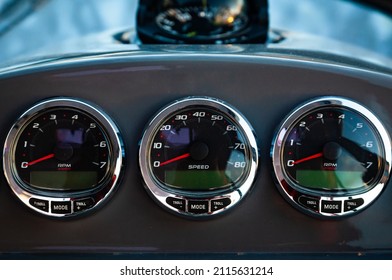 Motor yacht control panel. Gauges, speedometers and control buttons.