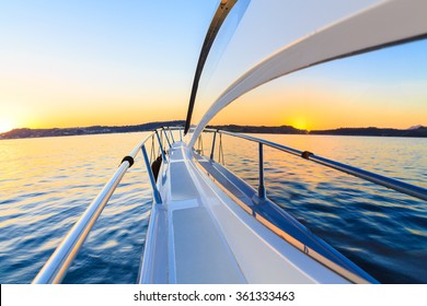 motor yacht at sunset