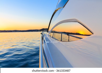 Motor Yacht At Sunset