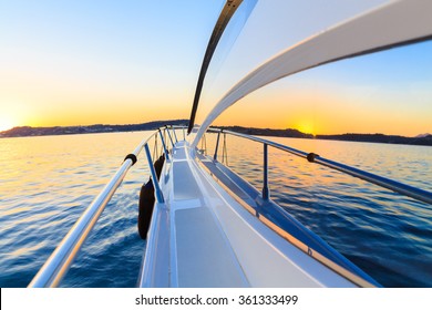 Motor Yacht At Sunset