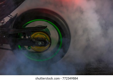 Motorbike burnout, Biker on a motorcycle drifts in smoke, burns the tire on a motorcycle.