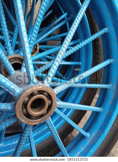 Motorbike wheel rims from\
roadside shops