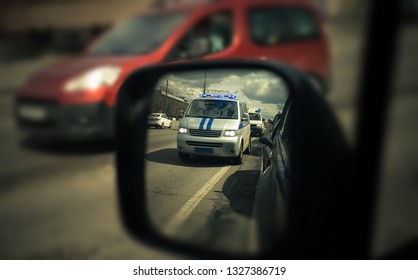 Motorcade Of Police Vans In My Rearview Mirror