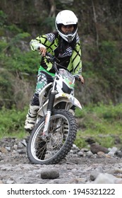 Motorcross Driver Woman Road In Forest. Dirt Motocross Bike Rider Woman. Osaka Japan. March 28, 2021