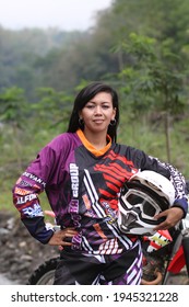 Motorcross Driver Woman Road In Forest. Dirt Motocross Bike Rider Woman. Osaka Japan. March 28, 2021