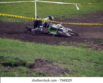 A Motorcross Rider Falling Off His Bike