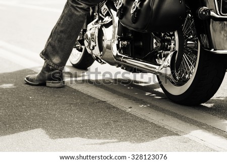 Similar – Image, Stock Photo Couple sitting over motorcycle ready to go