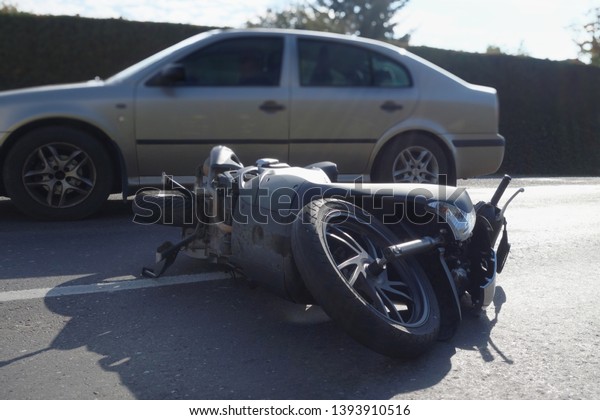 Motorcycle accident, crash at sunny day.\
Motorcycle crash\
concept.