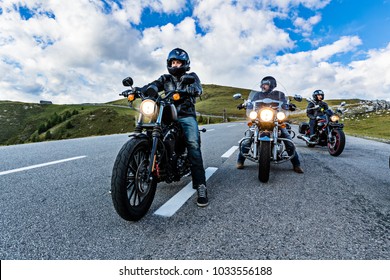 Motorcycle drivers riding in Alpine highway, Nockalmstrasse, Austria, central Europe.