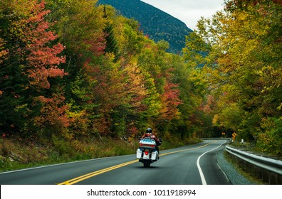 Motorcycle Driving On The Road On The White Mountains During The Fall, New Hampshire, USA