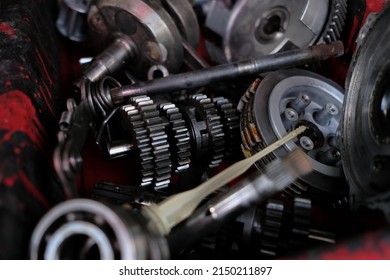 Motorcycle Engine Parts Waiting To Be Repaired Or Assembled By A Mechanic.