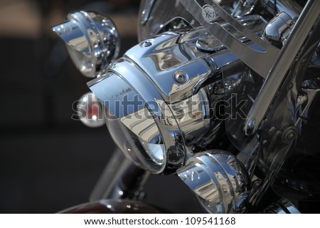Motorcycle headlights close-up background