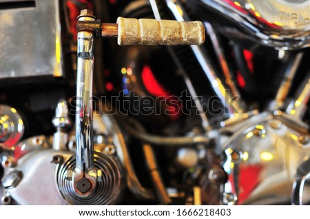 Motorcycle kick starter for background and texture.
