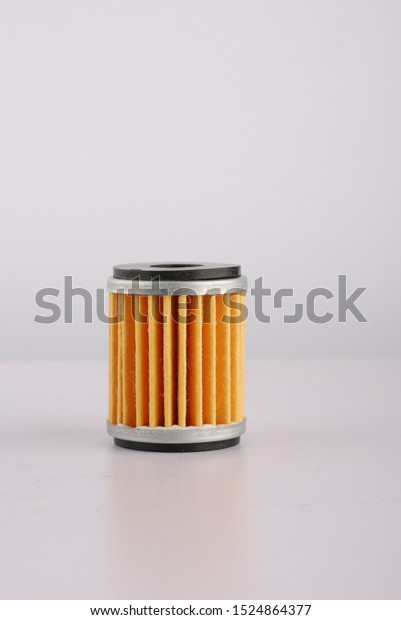 Motorcycle Oil Filter on\
White Background  