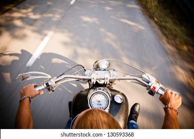 Motorcycle On A Open Road From A Different Point Of View.