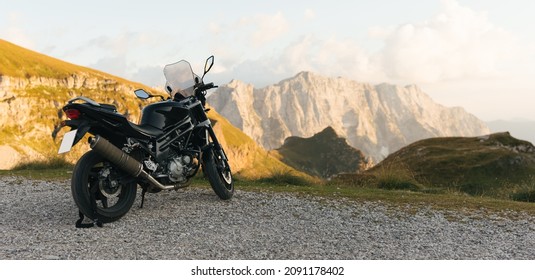 Motorcycle parked with the view on Julian Alps