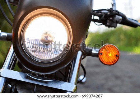 Similar – Motorcycle headlights with senior man steering