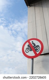 Motorcycle prohibition signs are installed in community areas to prevent motorcycles from entering area to prevent accidents. exercise area has installed signs prohibiting motorcycles from entering  - Shutterstock ID 2202728605