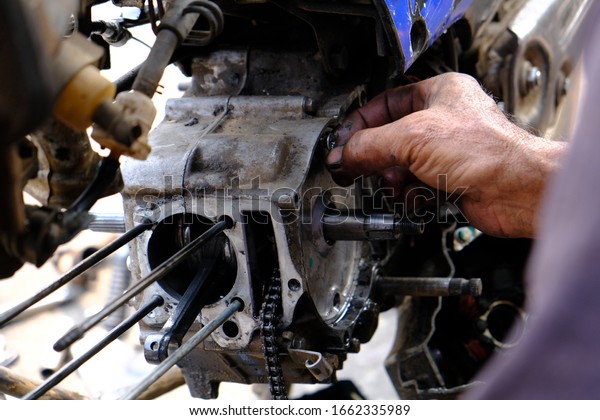 Motorcycle Repair Technician Disassembled Dismantle Engine Stock Photo