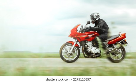 Motorcycle Ride At High Speed In The Countryside, Side View