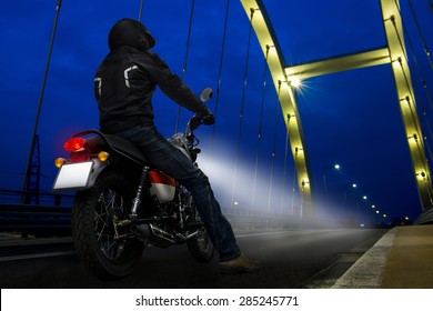 Motorcycle Rider At Night