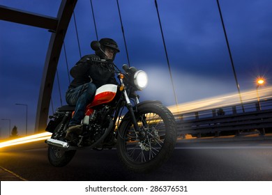 Motorcycle Rider At Night