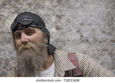 A Motorcycle Rider Poses For A Portrait Photograph At A House Of Vans Promotional Event In London. The Event Was Designed To Showcase A History Of Motorcycles In Britain. July 2017