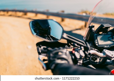 Motorcycle Rider Reflection In Side View Mirror