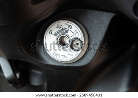 Motorcycle or scooter key socket, highlighting ignition details and mechanical design