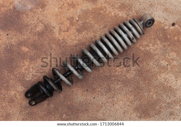 motorcycle shock absorber damage and engine oil\
flows out and dust and\
rust