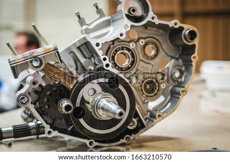 Motorcycle single cylinder engine on a table