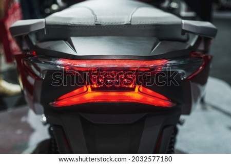 Motorcycle tail brake light. Red tail brake light.