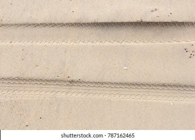 Motorcycle Tire On Sand Top View