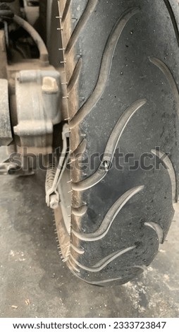 Motorcycle tire punctured by a nail
