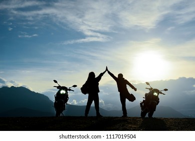 motorcycles and crazy people reaching the peak of the mountains - Shutterstock ID 1117019504