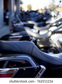 Motorcycles lined up in a row