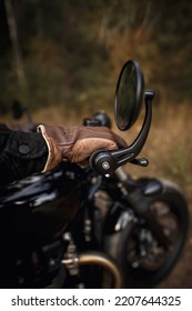 Motorcyclist In Brown Leather Gloves. Vintage Wallpaper