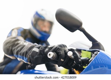 Motorcyclist Driving His Motorbike In The City.