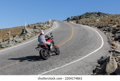 Motorcyclist Going Up Mount Washington On Auto Road