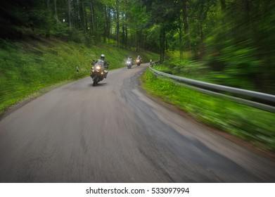 Motorcyclists Convoy In The Forest