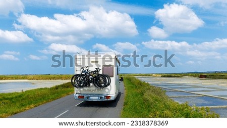 Motorhome on the road- travel destination,  vacation,  wanderlust or freedom concept (France, Brittany)