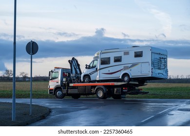 A motorhome on a tow truck - Shutterstock ID 2257360465