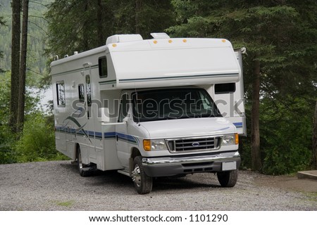 motorhome with slide-out - on a campground in the whiteswan lake provincial park, british columbia, canada