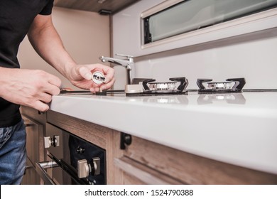 Motorhome Stove Problem. Repairing And Replacement Broken Elements Inside Recreational Vehicle. After Season Maintenance.