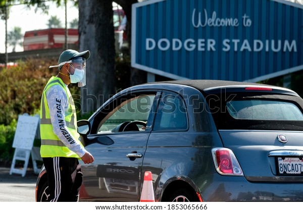 Motorists line
up to take a coronavirus (COVID-19) test at Dodger Stadium,
Thursday, Nov. 12, 2020, in Los Angeles.
