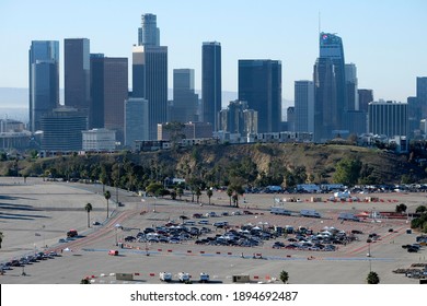 Motorists Wait In Lines To Get The Coronavirus (COVID-19) Vaccine In A Parking Lot At Dodger Stadium, Friday, Jan. 15, 2021, In Los Angeles. 