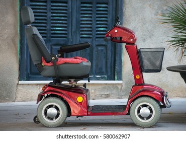 Motorized wheelchair car for disabled people.