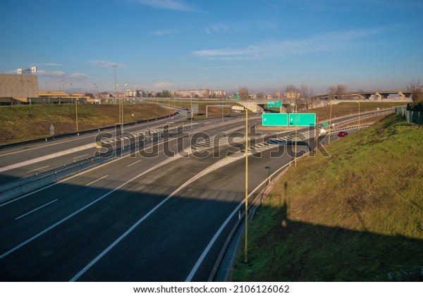 motorway, motorway\
junction, with no indication of place, desert, as when traffic is\
at an all-time low.