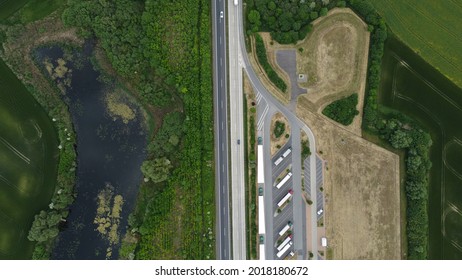 Motorway Service Station Next To Forest And Marsh From Above