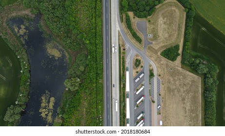 Motorway Service Station Next To Forest And Marsh From Above